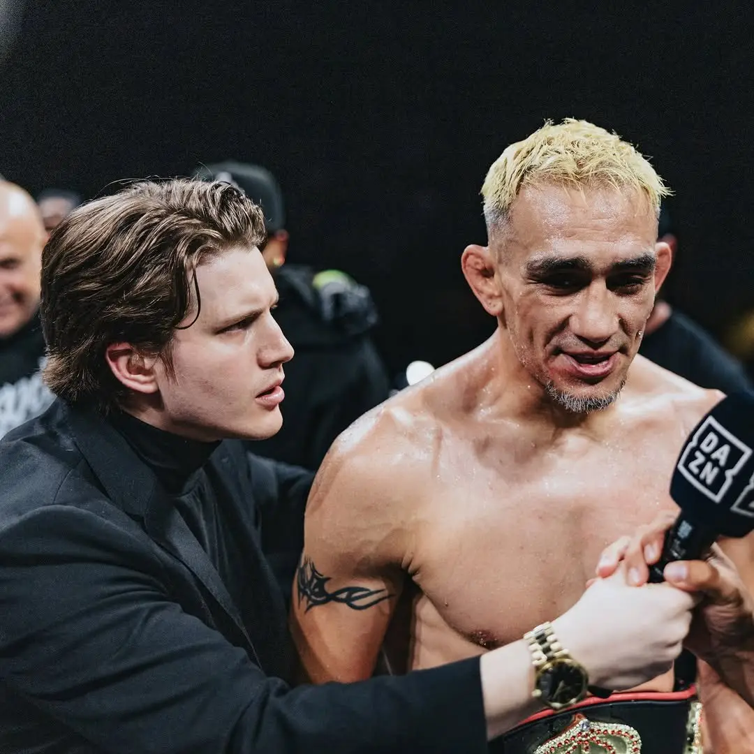 Ben Davis interviewing Tony Ferguson ringside for DAZN