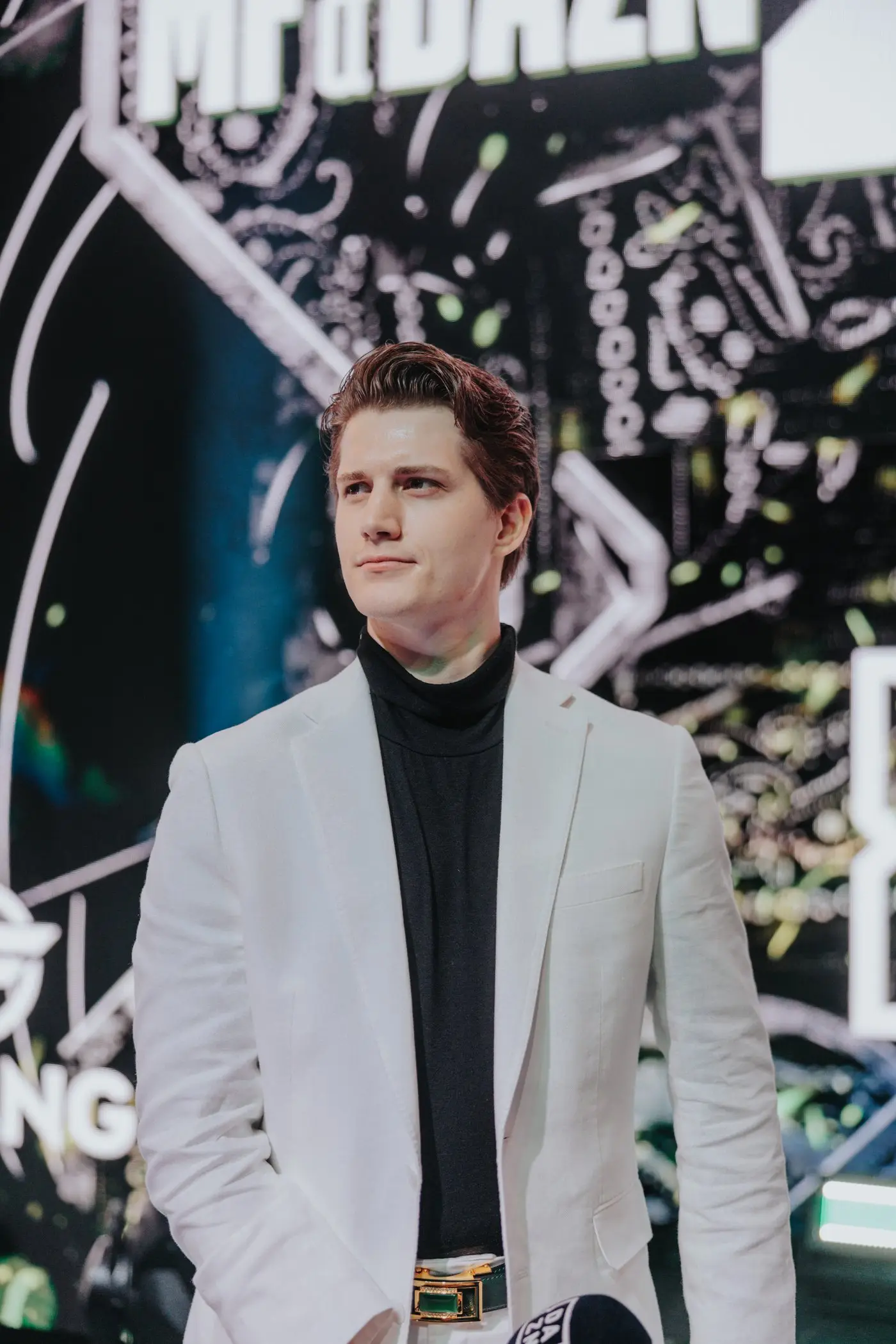 Ben “The Bane” Davis in a white jacket at a DAZN X Series event